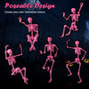 Life-size pink poseable skeleton with movable joints, perfect for Halloween decorations and creating spooky scenes.