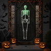 Life-size 5.5 FT Halloween skeleton with green illuminating eyes, perfect for indoor or outdoor spooky decorations.