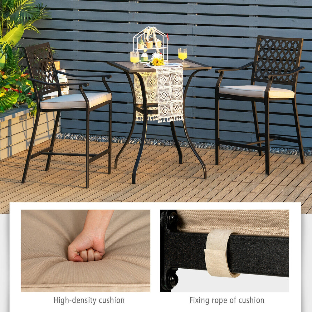 Two patio bar stools with high-density cushions and armrests, perfect for poolside or backyard relaxation.