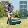 Push lawn roller with a green metal finish, ideal for leveling soil and packing down seed for a perfect lawn.