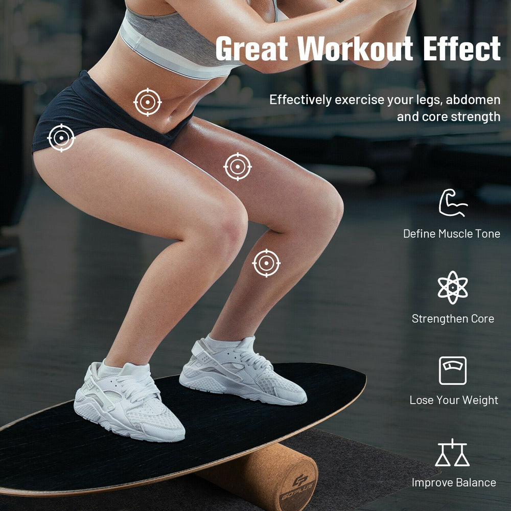Balance board trainer in black, made of birch and cork wood, for core strength and balance improvement at home or gym.