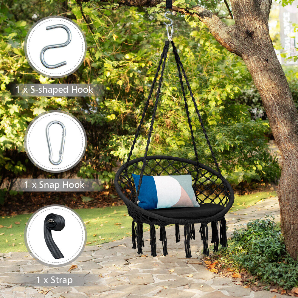 Cushioned black hammock swing chair with tassels and hanging kit, perfect for indoor or outdoor relaxation.