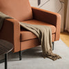 Modern orange accent armchair with side storage pocket, featuring ergonomic design and cozy backrest for ultimate.