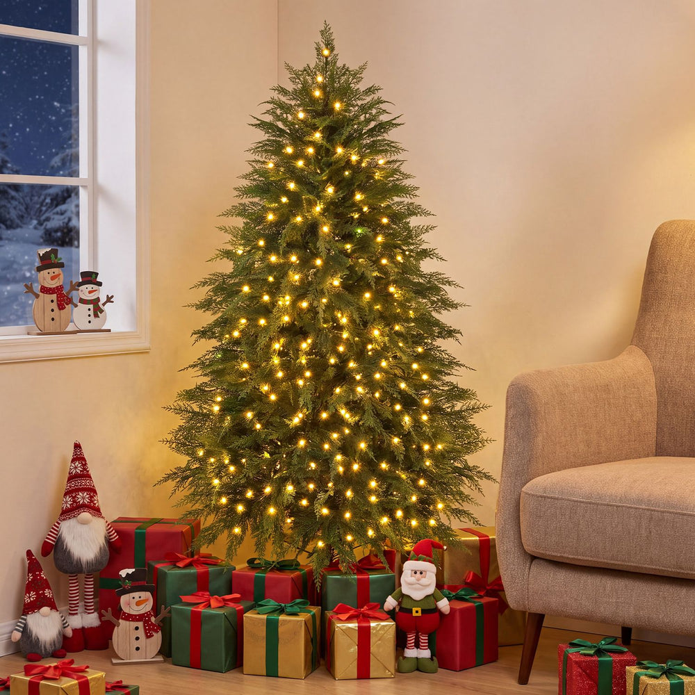 5 FT artificial Christmas tree with 406 branch tips and warm white LED lights, creating a cozy holiday atmosphere.