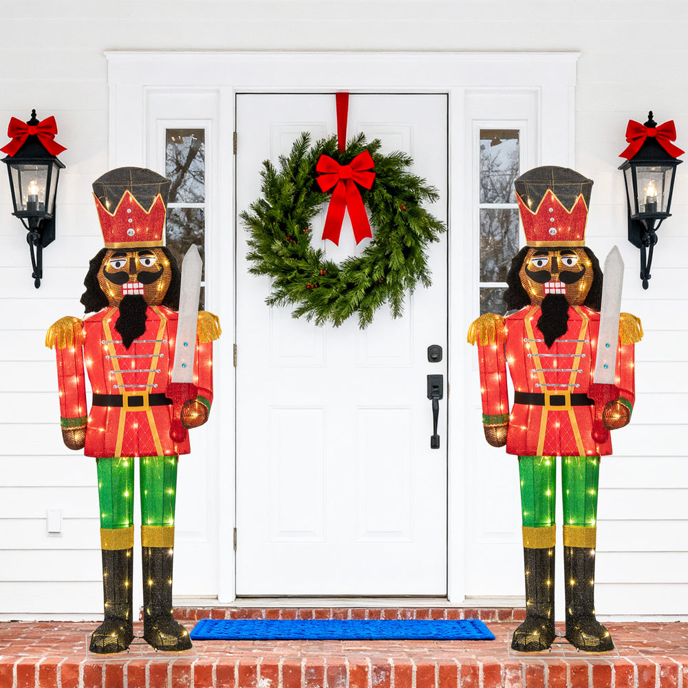 5 FT lighted Christmas nutcracker decorations with glitter swords, featuring warm-white LED lights for outdoor holiday.
