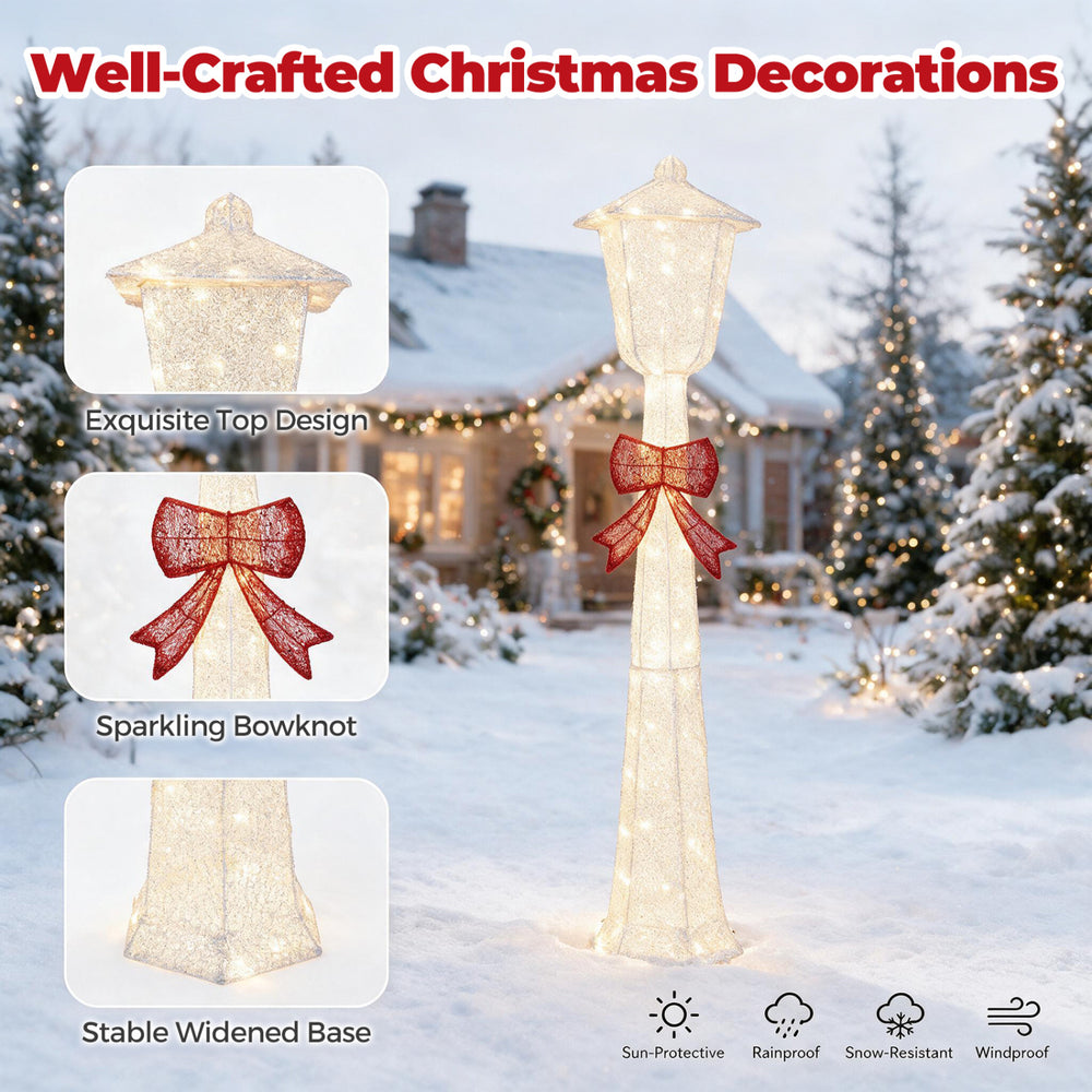 5 FT lighted Christmas lamp post with red bowknot decoration, featuring a stable base and weather-resistant design for outdoor use.