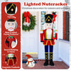 5 FT Christmas nutcracker decoration with glitter sword, tall hat, and LED lights for festive indoor and outdoor.