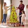 Family decorates a 5 FT pre-lit artificial Christmas tree with 670 warm white lights for festive celebrations.