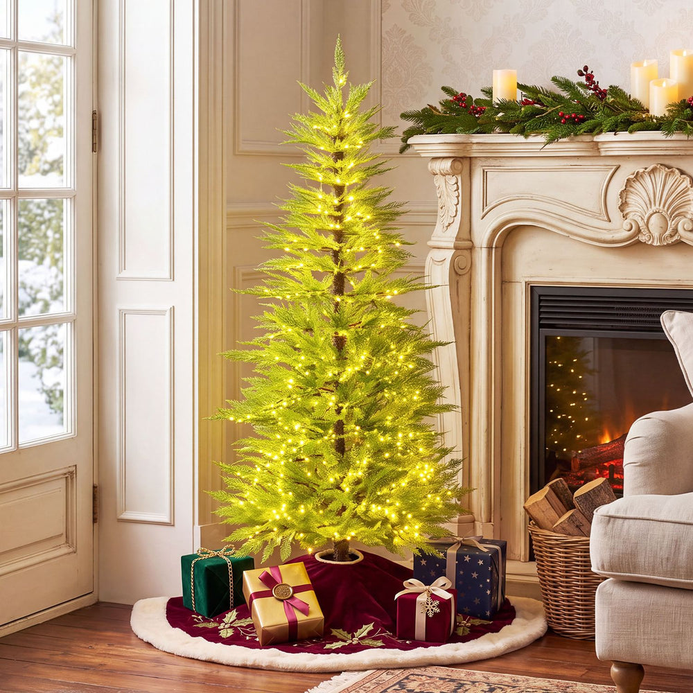 5 FT pre-lit artificial Christmas tree with 670 warm white lights, featuring a sparse cypress profile for a festive glow.
