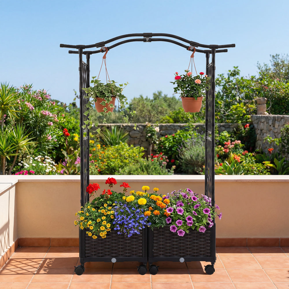 5 FT tall raised garden bed with lockable wheels, hanging roof, and vibrant flowers in planter boxes for outdoor decor.