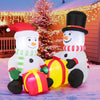 Adorable 5-foot inflatable snowmen with vibrant gift boxes, designed for a cheerful holiday display indoors or outdoors.