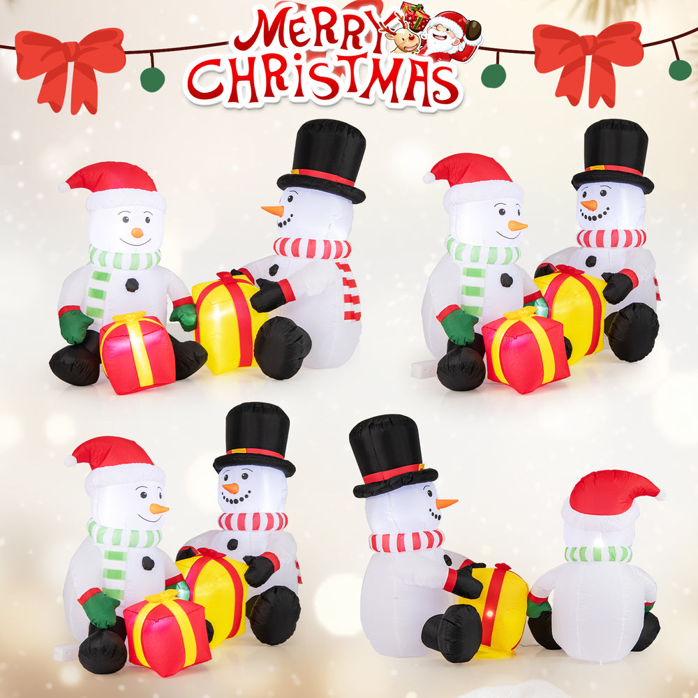 Cute 5-foot inflatable snowmen with gift boxes, pre-lit with LED lights for festive indoor and outdoor holiday decor.