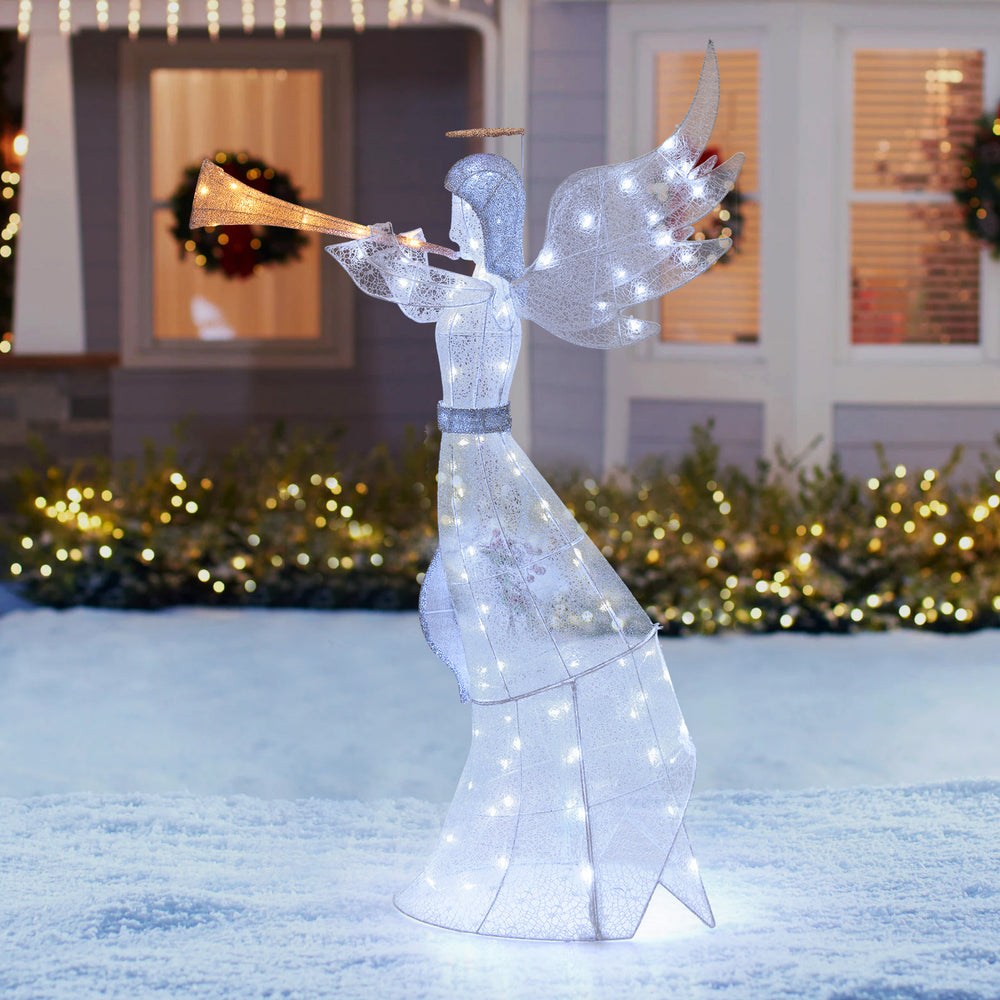 5-foot Christmas angel with 100 LED lights, halo, and trumpet, perfect for outdoor holiday decoration.