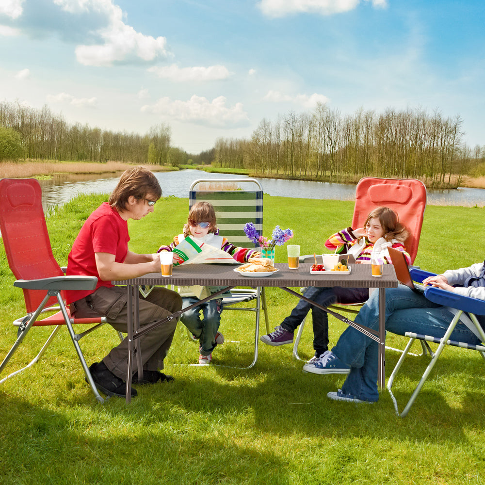 Folding picnic table with rattan grain HDPE tabletop, accommodating 4-6 people, perfect for outdoor gatherings.