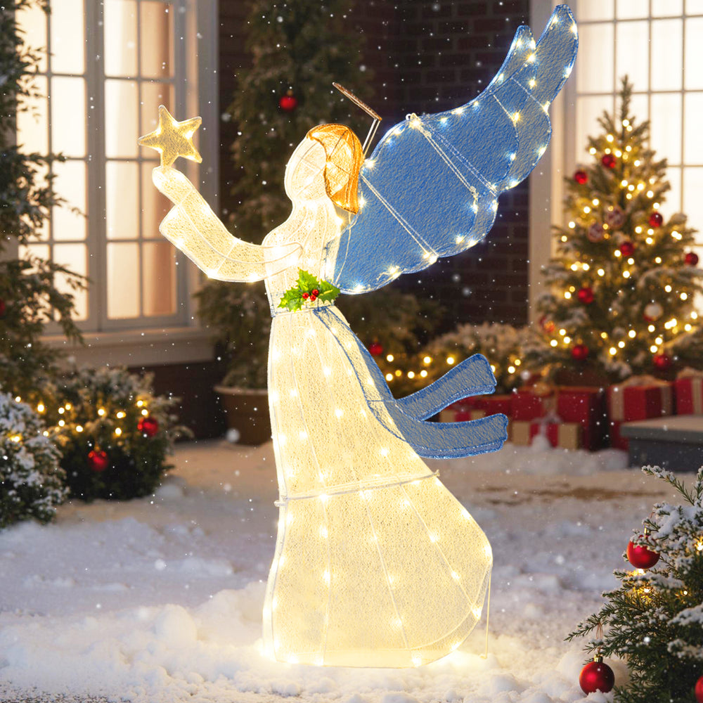 Lighted 5-foot angel Christmas decoration with wings, warm LED lights, and holly, perfect for outdoor holiday displays.