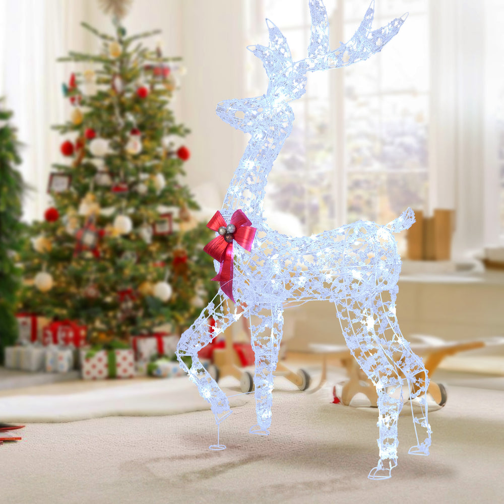 5-foot pre-lit Christmas reindeer with 100 LED lights, featuring antlers and a red bow, perfect for festive indoor or.