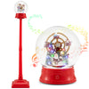 Close-up of the red 5 ft musical Christmas snow globe lantern showcasing the Santa and snowman Ferris wheel scene with.