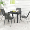 Outdoor dining table set featuring an extendable aluminum table and 4 stackable chairs, perfect for patios and.