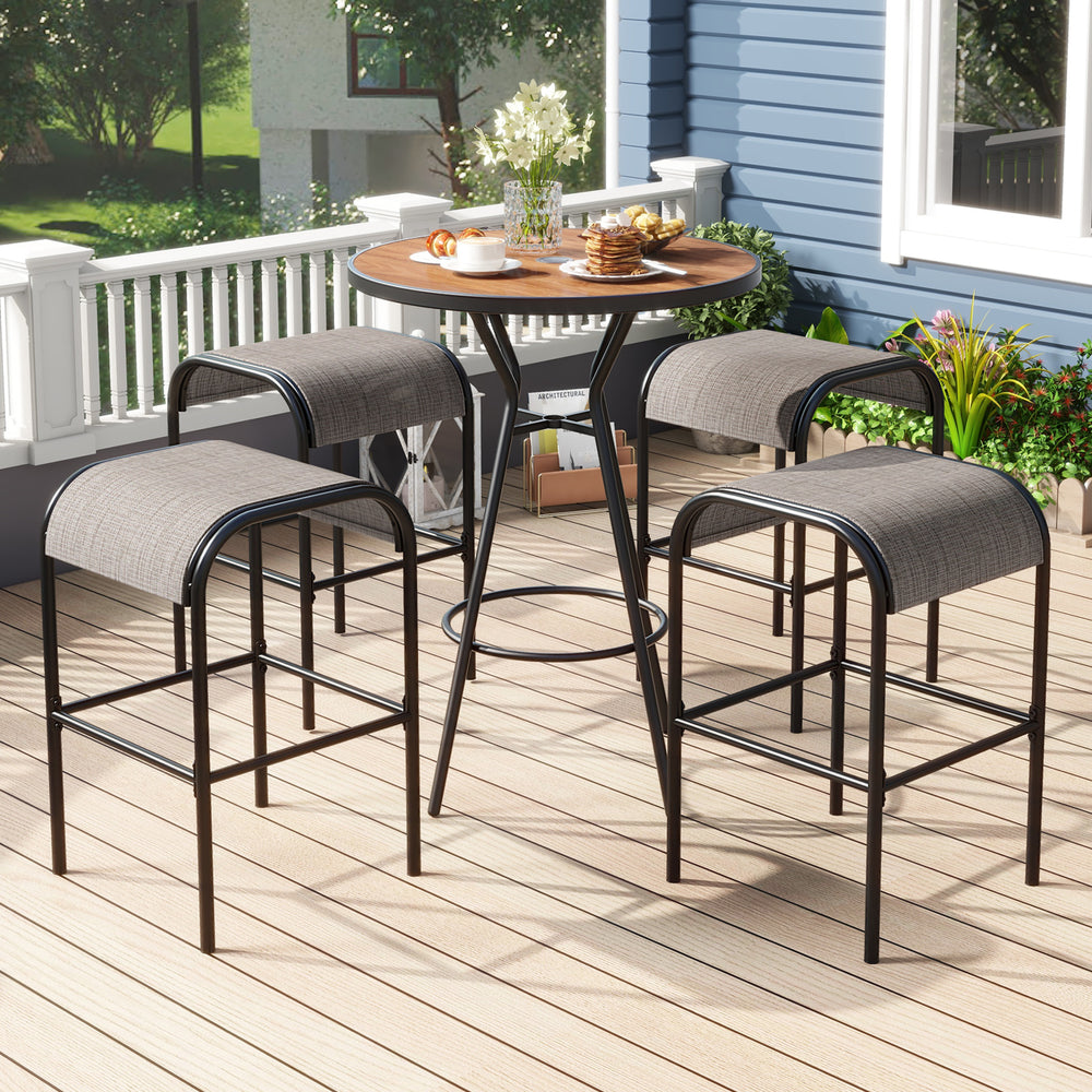 Outdoor bar table set featuring a wood-grained tabletop and four breathable fabric bar stools, ideal for patio.