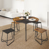 Round 47-inch dining table with 4 stools in brown and black, perfect for small spaces and stylish coordination.