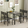 Grey dining table set for 4 with ergonomic chairs, showcasing an elegant grain and industrial style for any decor.