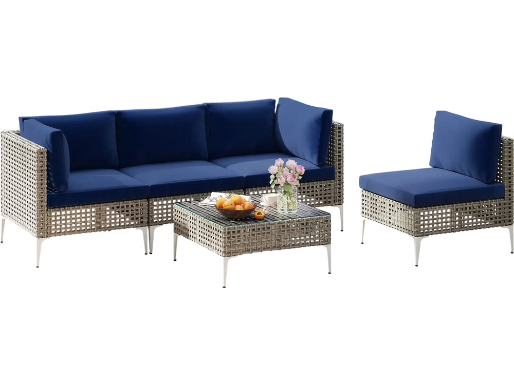 Single chair from the 5-piece patio set, showcasing navy cushion and elegant PE rattan, perfect for outdoor comfort.