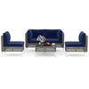 5-piece outdoor furniture set featuring navy cushions, PE rattan chairs, and a tempered glass coffee table for patio.