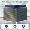 Single patio chair in mix gray PE rattan with navy cushion, ideal for outdoor use and backyard relaxation.