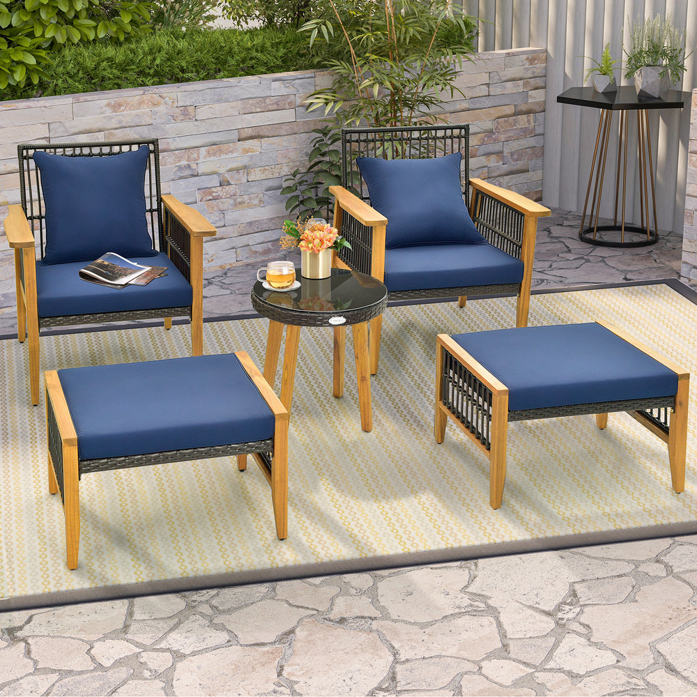 5-piece patio furniture set featuring navy cushions, acacia wood, and PE rattan, ideal for outdoor relaxation.