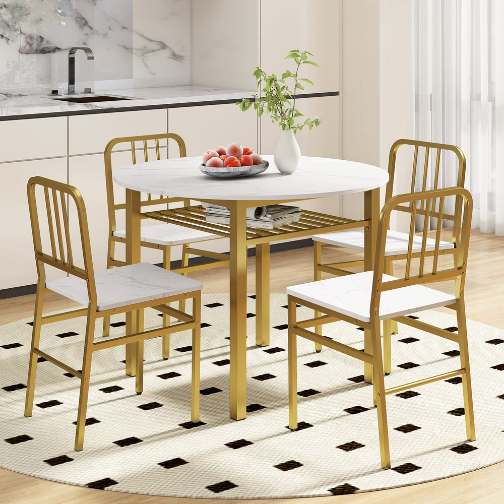 Round dining table set with four gold chairs, featuring a storage shelf and a smooth white surface for dining room use.