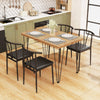 Rectangular dining table set with 4 armless chairs, black metal legs, and wood-like veneer for space-saving kitchen use.