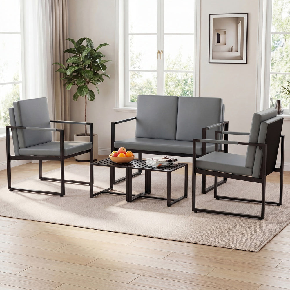 Gray living room set with two accent chairs and two coffee tables, showcasing a modern minimalist design for compact.