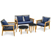 5-piece outdoor conversation set featuring navy cushions, acacia wood frame, and two coffee tables for backyard.