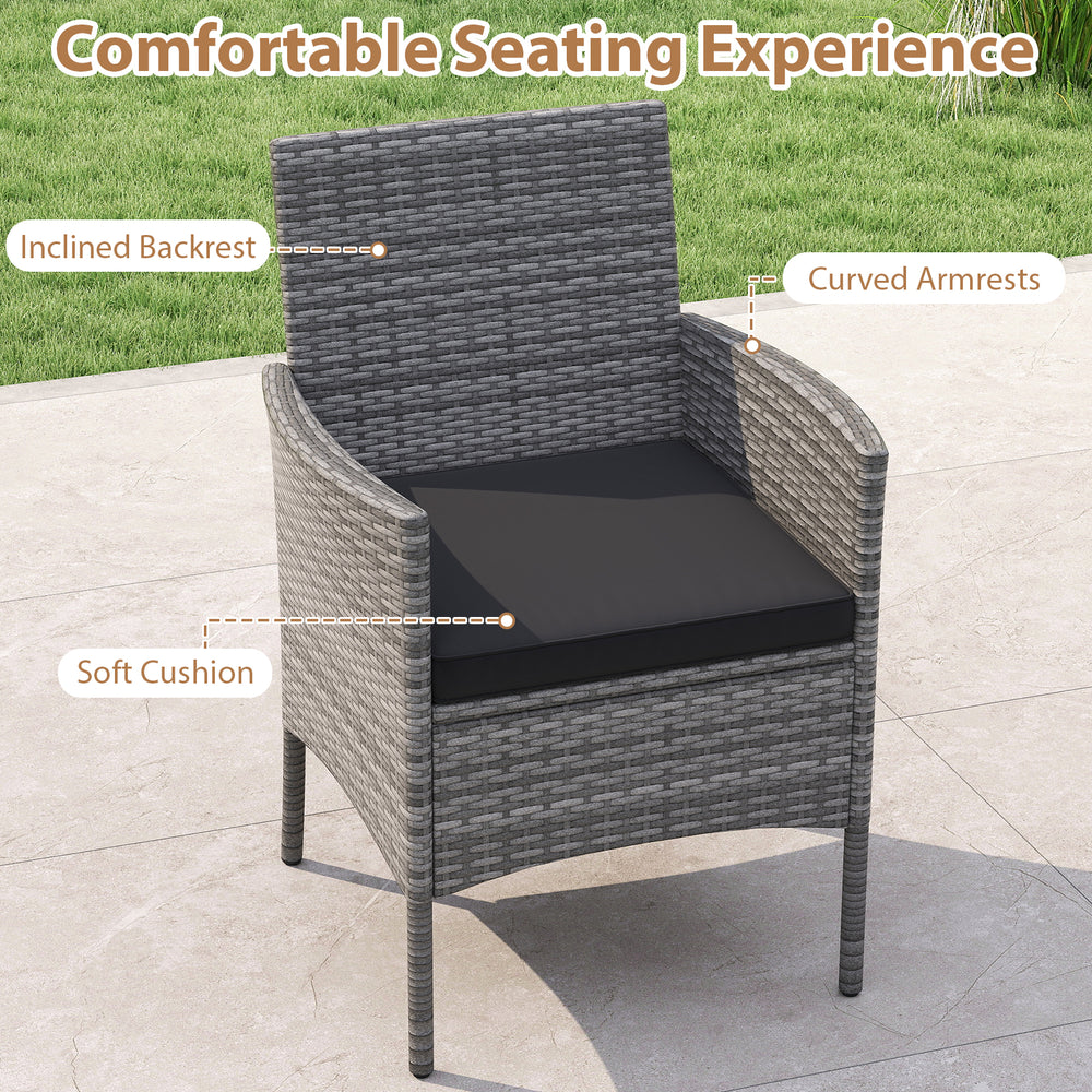 Single chair from the 5 Pieces PE Wicker Patio Dining Set with soft cushion, inclined backrest, and curved armrests for.