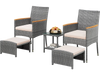 Patio conversation set featuring two armchairs, ottomans, and a glass table, crafted from grey PE rattan for outdoor.