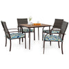 Square table with four cushioned rattan armchairs, perfect for outdoor dining in backyard or poolside settings.