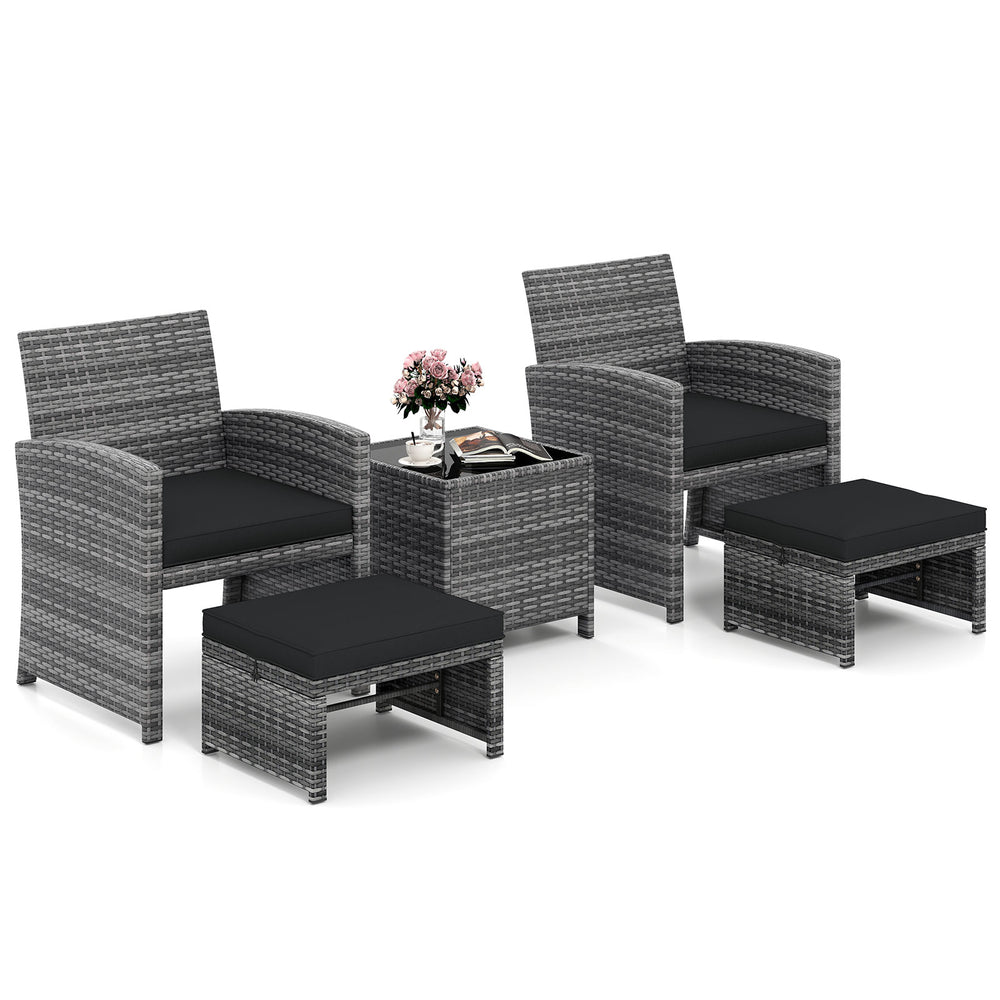 5-piece patio furniture set featuring two lounge chairs, two ottomans, and a glass-top table for compact outdoor spaces.