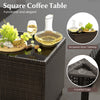 Square coffee table with tempered glass top and rattan design, perfect for outdoor patio use with drinks and snacks.