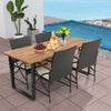 5-piece patio rattan dining set featuring an acacia wood tabletop, ergonomic chairs, and a poolside setting.