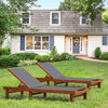 Adjustable outdoor wood chaise lounge chair in a garden setting, featuring breathable fabric and sturdy eucalyptus wood.