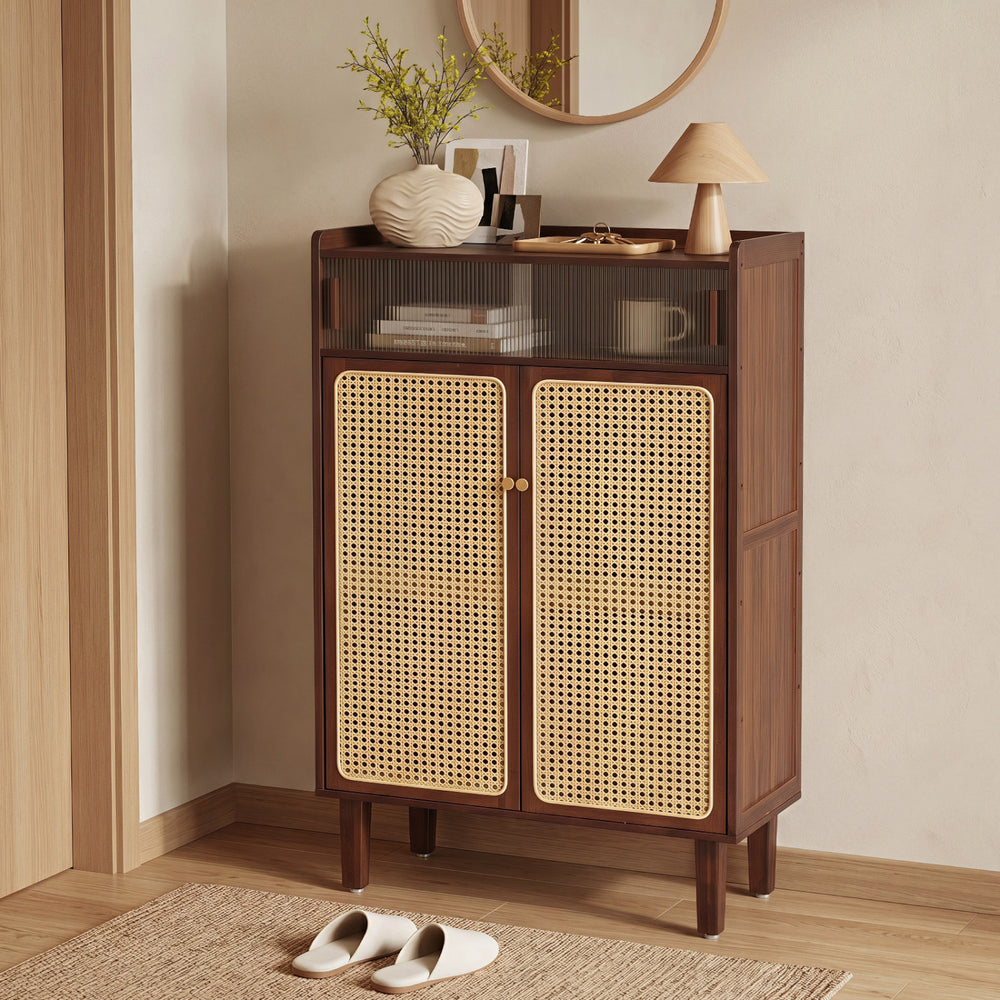 Bamboo shoe cabinet with woven rattan doors, featuring sliding doors and ample storage for entryway organization.