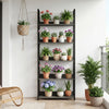 5-tier wooden bookshelf in oak displaying various potted plants, ideal for indoor or outdoor decoration.