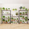 5-tier black metal shelving unit set of 2 with adjustable shelves, ideal for plant display in various indoor settings.