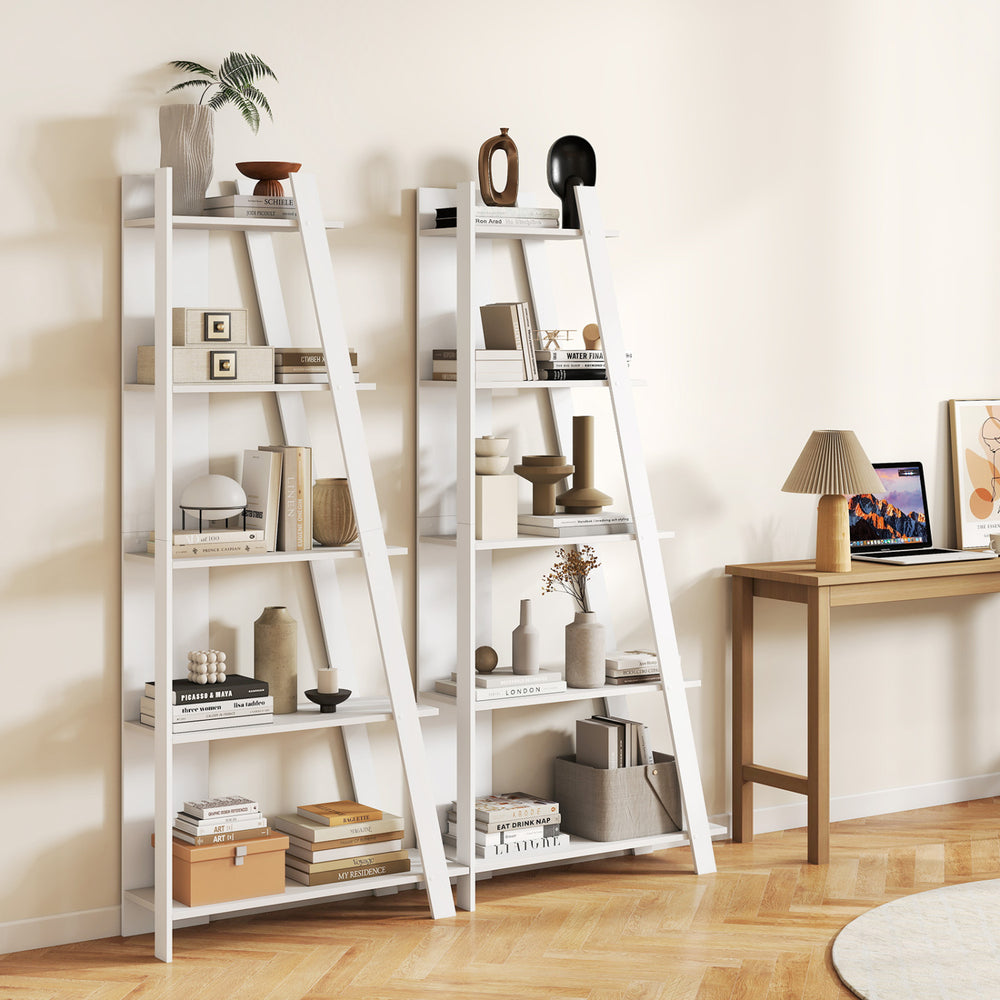 5-tier white modern bookshelf with a wood-like surface, ideal for small spaces, displaying decor and plants.