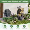 5-tier outdoor water fountain with LED lights, stone-like texture, and durable resin for patio or deck decoration.