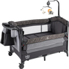 5-in-1 bedside bassinet in gray with detachable changing table, mesh panels, and plush toys for newborn comfort and.