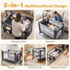 5-in-1 portable baby pack and play in black, featuring a changing table, bassinet, playpen, and activity center.