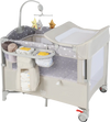 Portable 5-in-1 baby beside sleeper bassinet in beige with changing table, storage pockets, and hanging toys for.