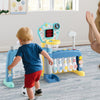 Toddler playing with a 5 in 1 sports toy featuring an adjustable basketball hoop, soccer goal, and interactive sounds.