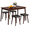 5-piece dining table set featuring a brown tabletop and upholstered stools with rubber wood legs, perfect for family.